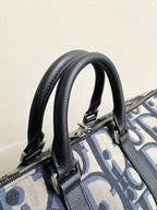 ウィークエンダー 40 ベージュ＆ブラック マキシ オブリーク ジャカード