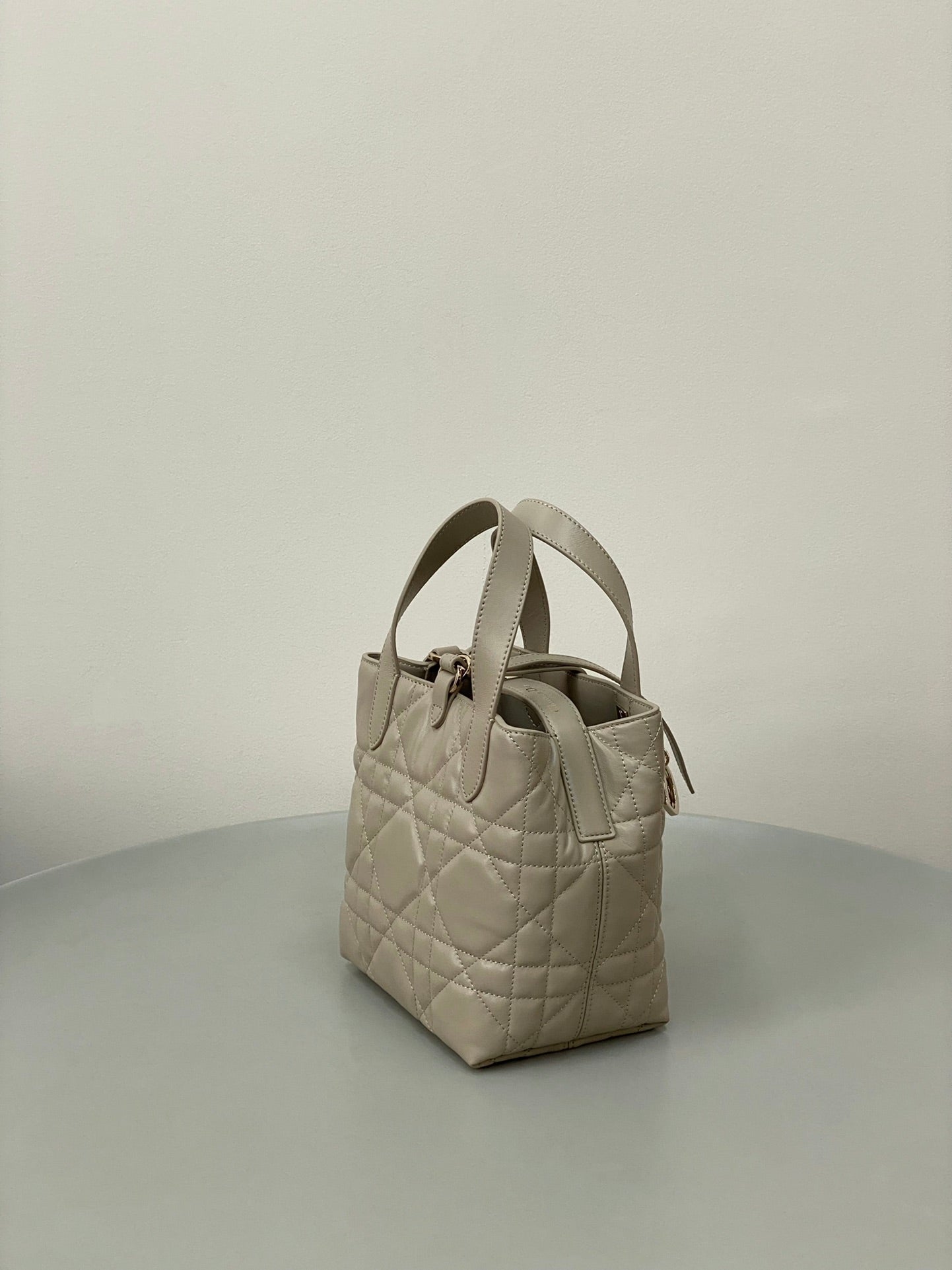 MINI TOUJOURS BUCKET BAG 18 IN BEIGE CANNAGE CALFSKIN