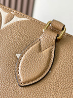 オンザゴー PM 25 ミルクティー モノグラム プリントレザー