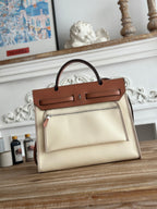 ジップ キャビン 31 バッグ（ホワイトクリームキャンバスとブロンズブラウンカーフスキン）