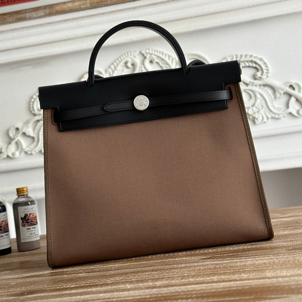 ZIP CABINE 31 BAG IN CHOCOLATE BROWN CANVAS AND BLACK CALFSKIN