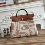 BOLSO HERBAG ZIP 31 RETOURNE BAG IN OFF-WHITE MIX BROWN H VIKING CANVAS AND COWHIDE