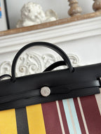 HERBAG ZIP 31 ラッカー加工バッグ（ブラウンミックスイエローHプルームキャンバス）