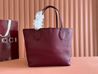 MEDIUM TOTISSIMA REVERSIBLE TOTE BAG 30 IN ROSSO ANCORA RED CALFSKIN BEIGE AND BROWN GG CANVAS ON SIDE