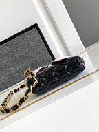 CC MINI 13 CLUTCH WITH STRAP IN BLACK LAMBSKIN AND PINK BOW