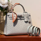 KELLY SELLIER 25 BAG IN PALE GRAY OSTRICH LEATHER WITH SILVER HARDWARE (MADE-TO-ODER)