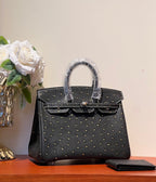 KELLY SELLIER 25 BAG IN BLACK OSTRICH LEATHER WITH GOLD RHINSTONES (MADE-TO-ODER)