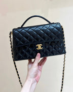 QUILTED FLAP BAG WITH HANDLE 26 IN BLACK LAMBSKIN GOLD PLATED METAL