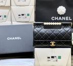 PEARL TOP HANDLE BAG 25 IN BLACK LAMBSKIN GOLD HARDWARE