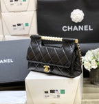 PEARL TOP HANDLE BAG 25 IN BLACK LAMBSKIN GOLD HARDWARE